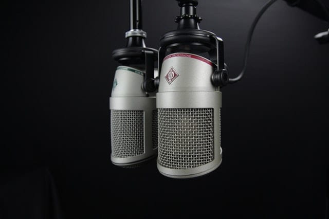 podcast microphones with a black background