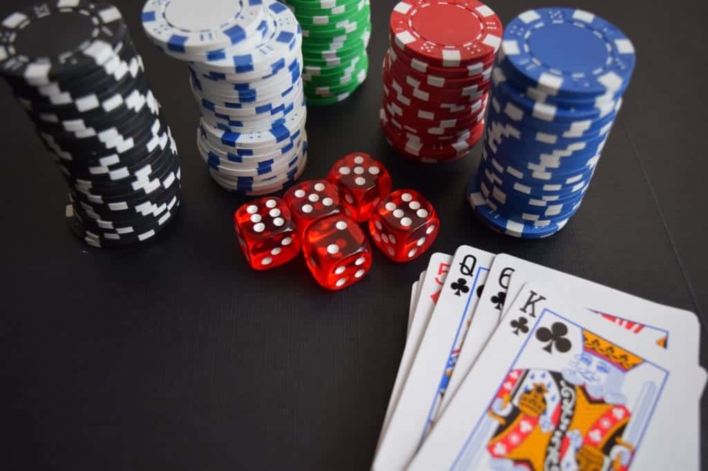 Poker chips, dice and playing cards