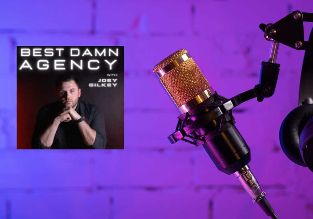 Podcast Microphone with "Best Damn Agency" podcast promo